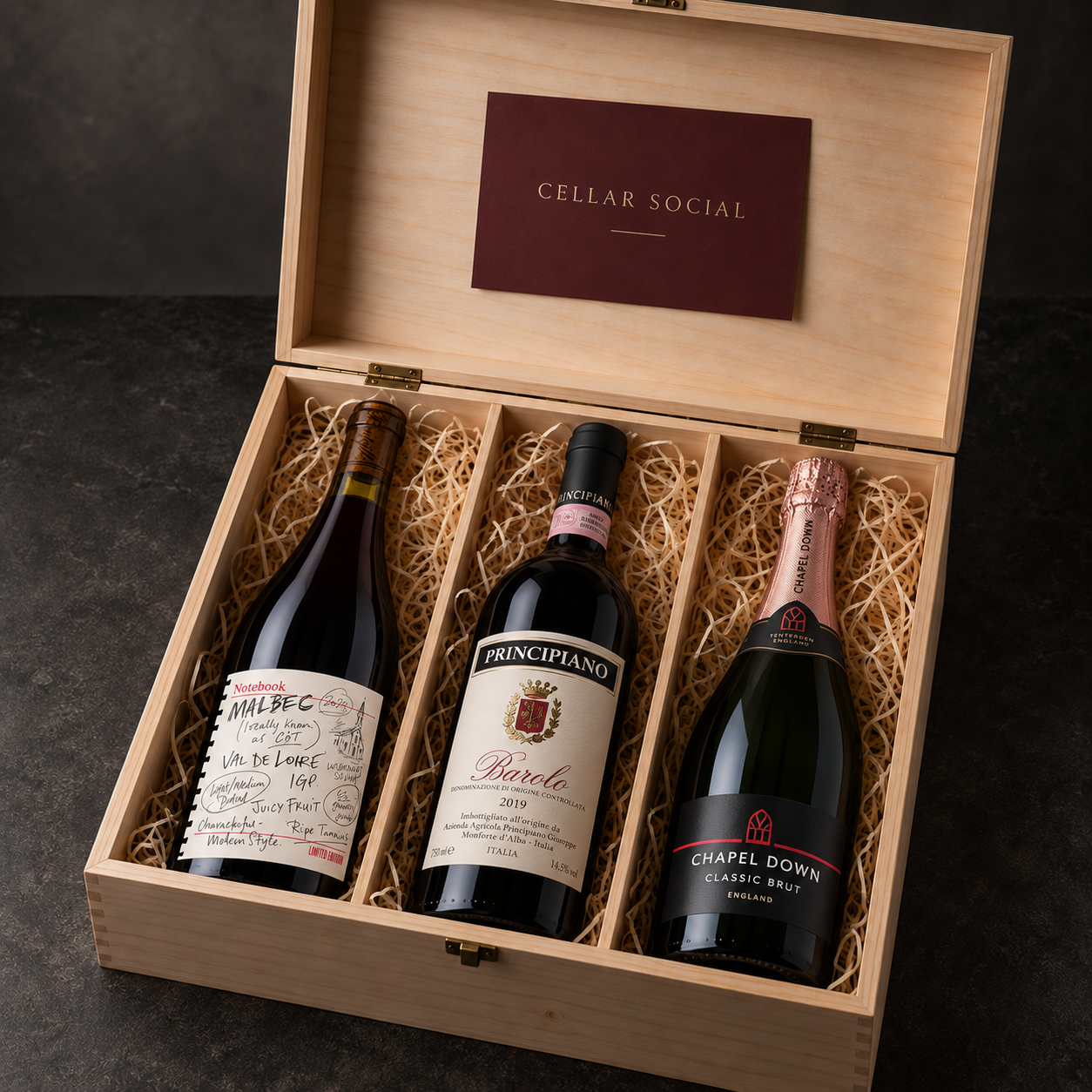 Three wines in a wooden Cellar Social presentation box